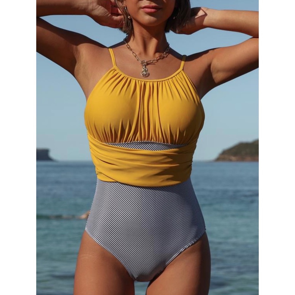 One piece swimsuit. New never worn!